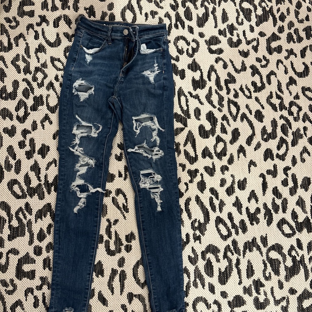 Distressed Blue Denim Jeans
